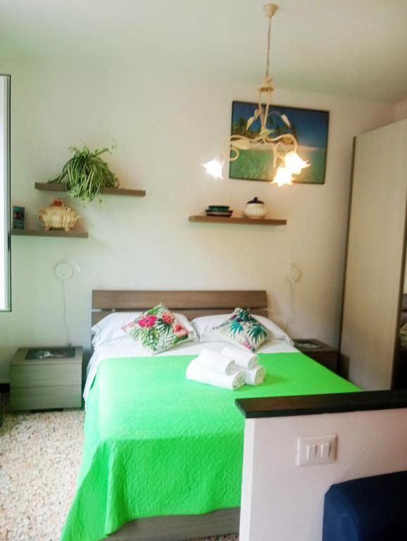 Postel nebo postele na pokoji v ubytování Casa Luigi