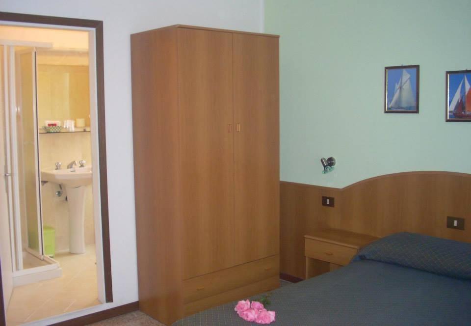 Postel nebo postele na pokoji v ubytování Hotel Fornaro