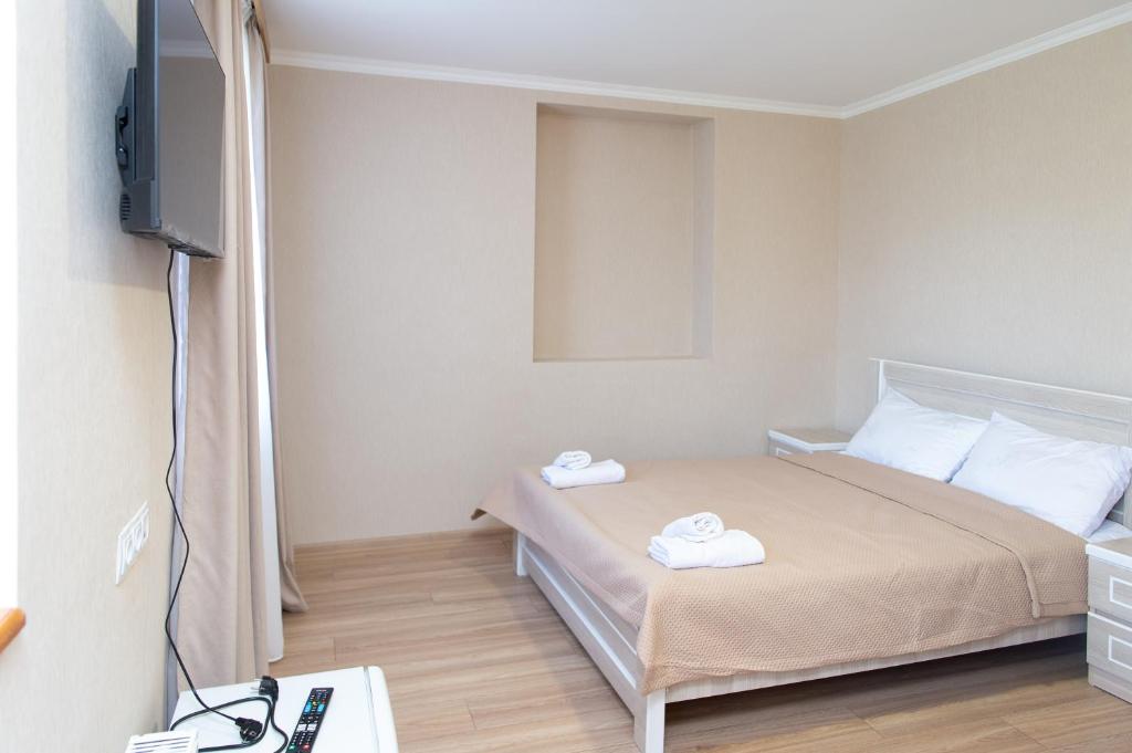 Postel nebo postele na pokoji v ubytování Hotel Veranda