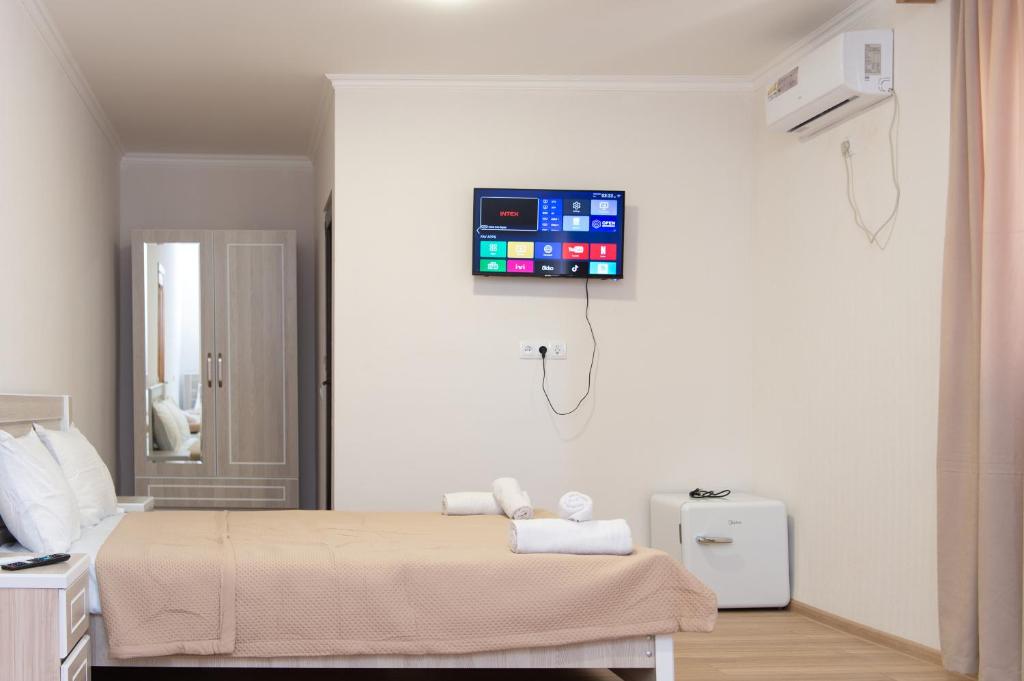 Postel nebo postele na pokoji v ubytování Hotel Veranda