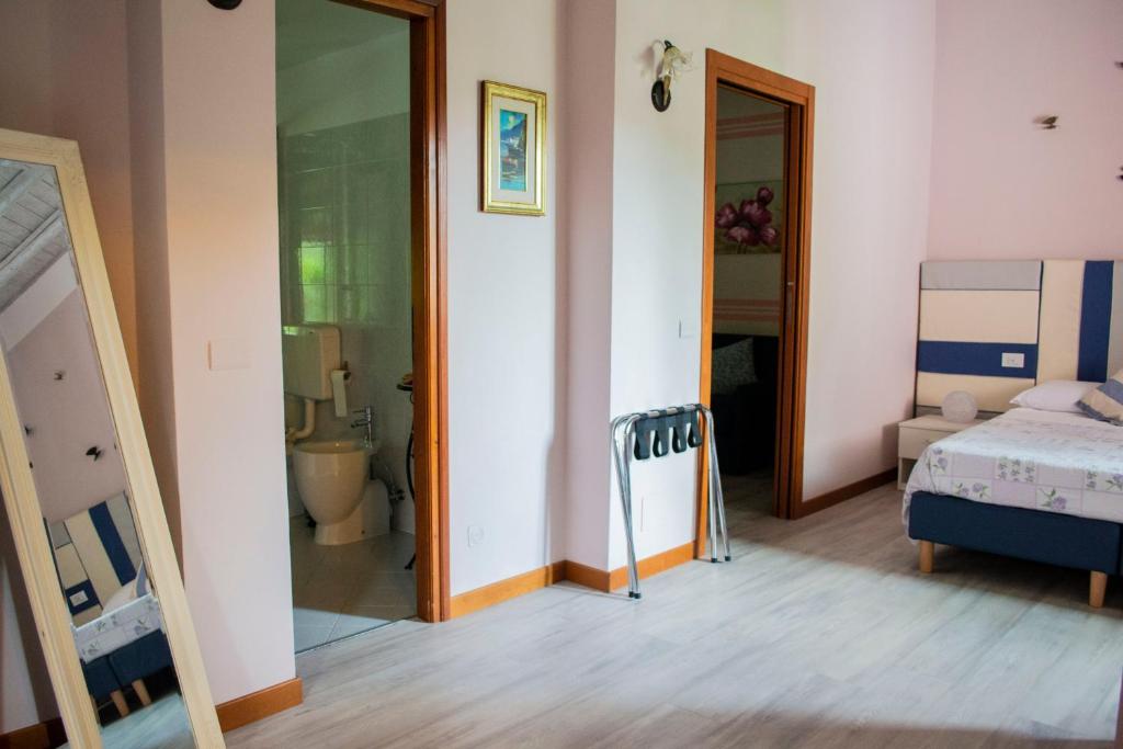 Postel nebo postele na pokoji v ubytování Casa di Nina