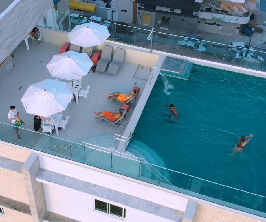 Πισίνα στο ή κοντά στο Verano Pajuçara by Tropicalis