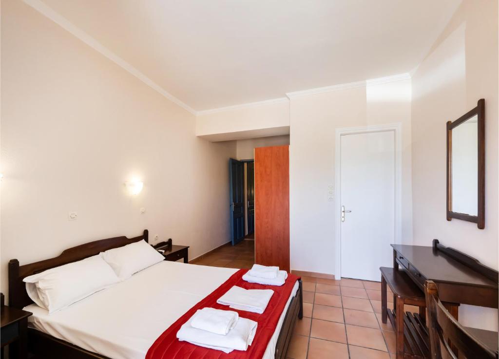 Postel nebo postele na pokoji v ubytování Ionio Hotel