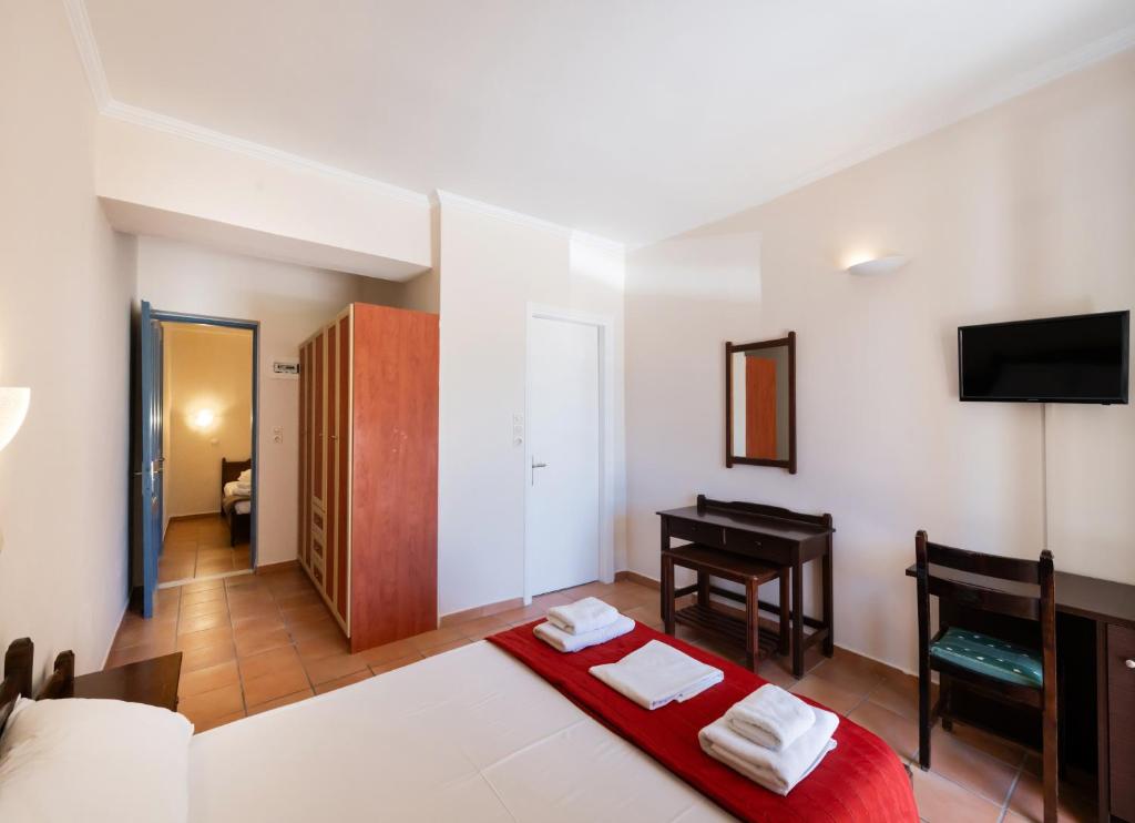 Postel nebo postele na pokoji v ubytování Ionio Hotel