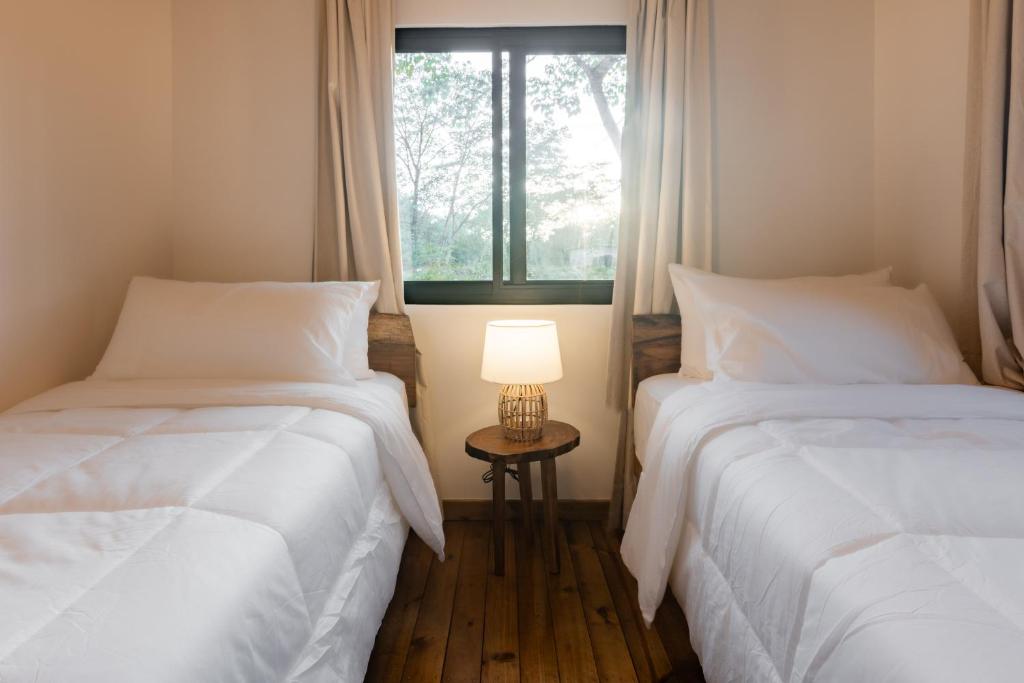 Postel nebo postele na pokoji v ubytování Dos Mares Venao Village