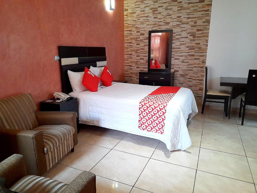 Postel nebo postele na pokoji v ubytování Hotel Posada Del Parque