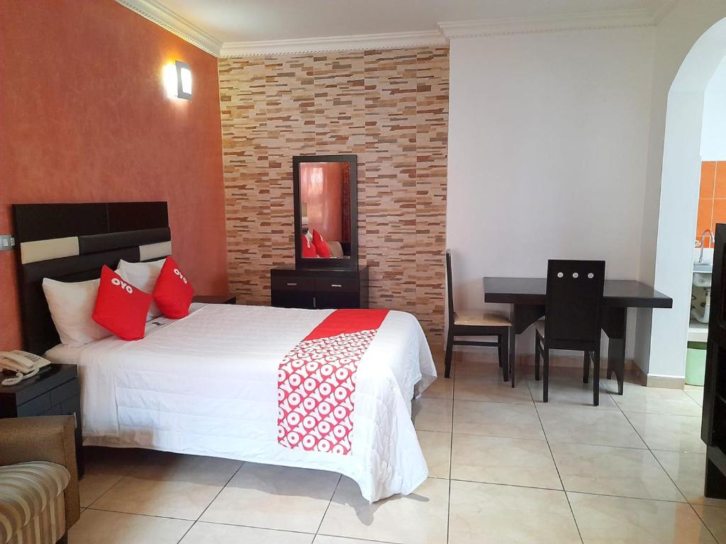 Postel nebo postele na pokoji v ubytování Hotel Posada Del Parque