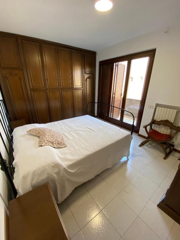 Postel nebo postele na pokoji v ubytování Casa Rina