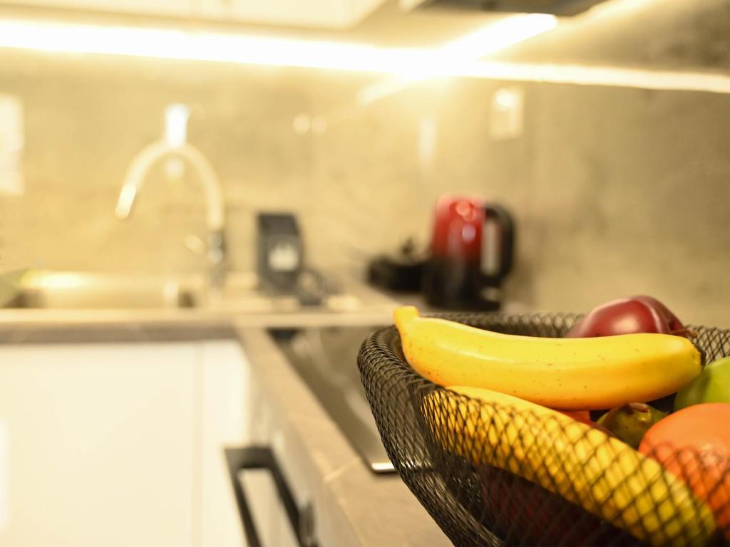 Kuchyň nebo kuchyňský kout v ubytování Zoé Suites