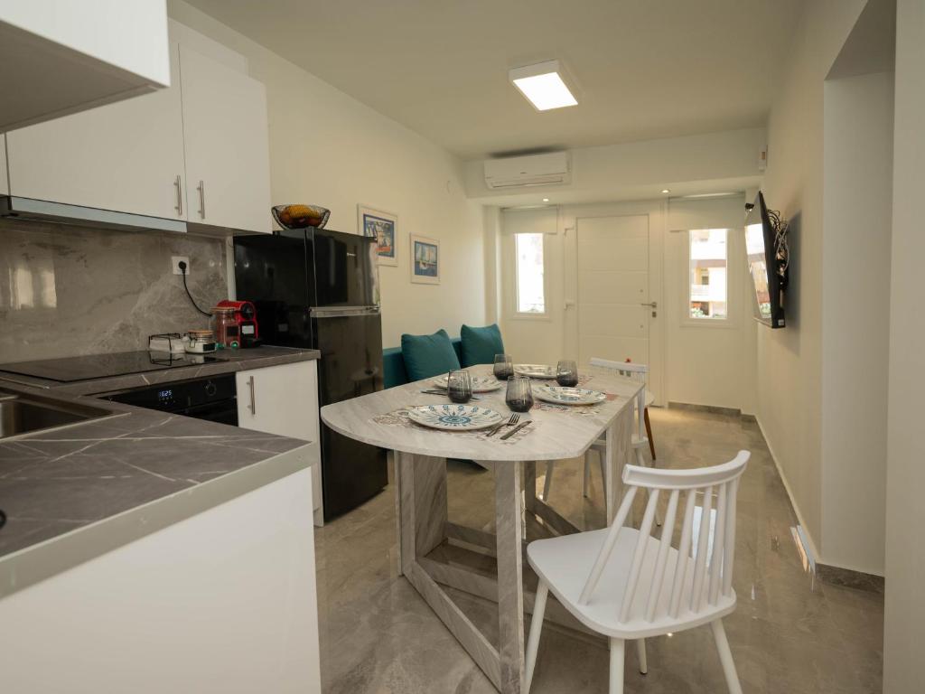 Kuchyň nebo kuchyňský kout v ubytování Zoé Suites