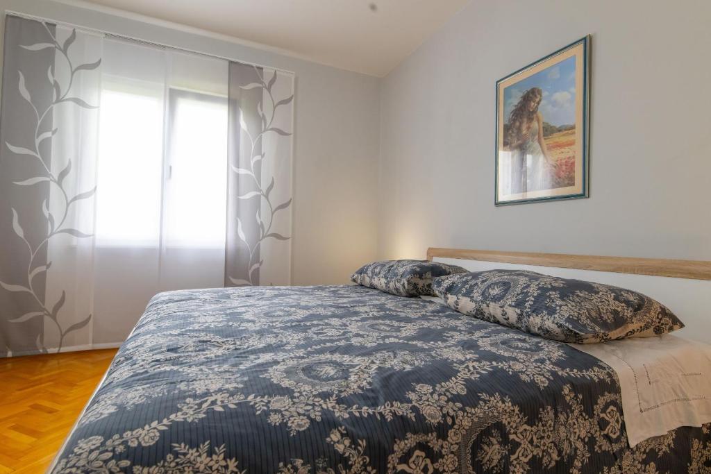 Postel nebo postele na pokoji v ubytování House Marija
