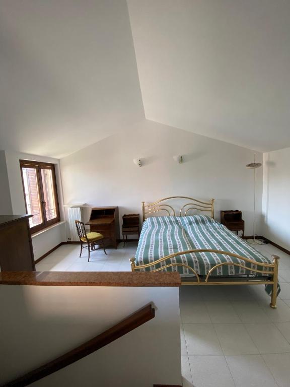 Postel nebo postele na pokoji v ubytování Casa Rina