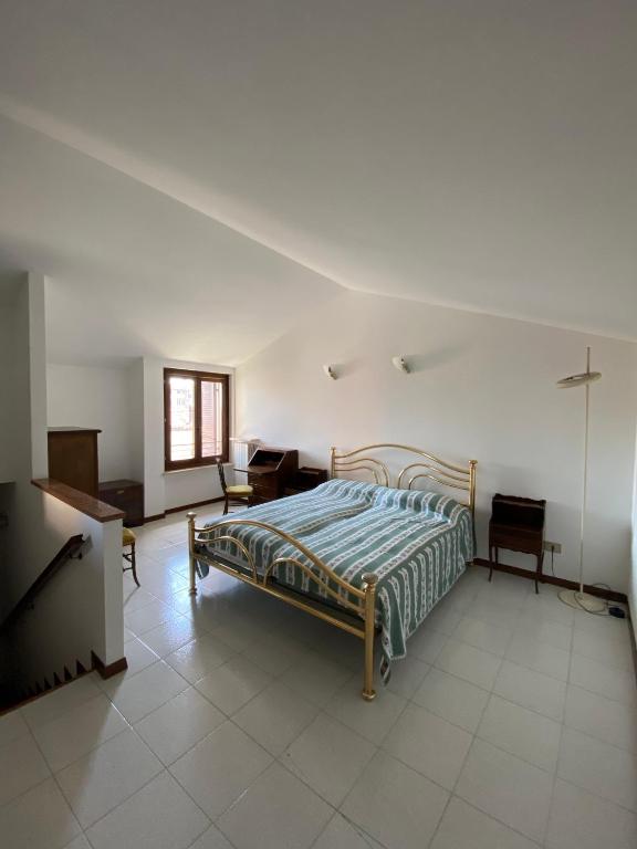 Postel nebo postele na pokoji v ubytování Casa Rina