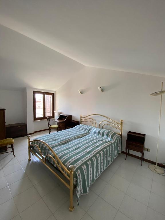 Postel nebo postele na pokoji v ubytování Casa Rina