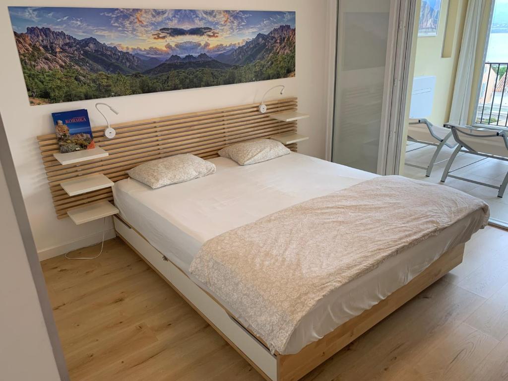 Postel nebo postele na pokoji v ubytování Apartment Vue Mer
