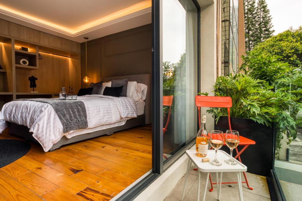 Postel nebo postele na pokoji v ubytování Casa Hannah B&B Boutique