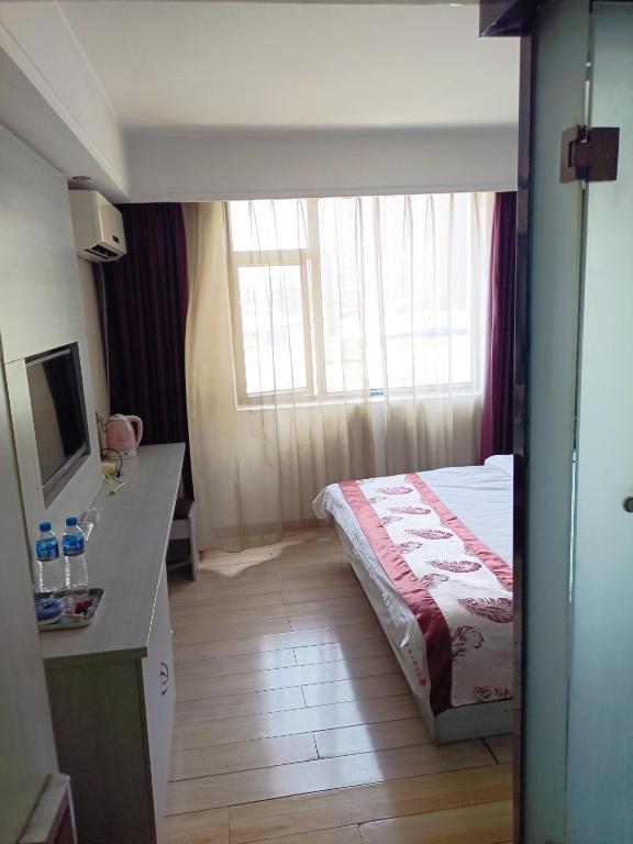 Postel nebo postele na pokoji v ubytování Juli Boutique Hotel