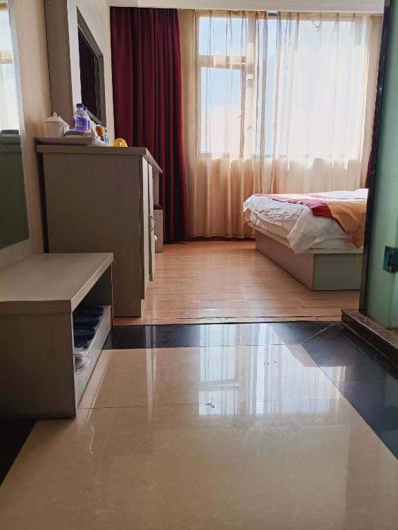 Postel nebo postele na pokoji v ubytování Juli Boutique Hotel