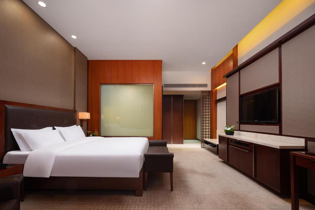 TV a/nebo společenská místnost v ubytování Parklane Hotel Changan