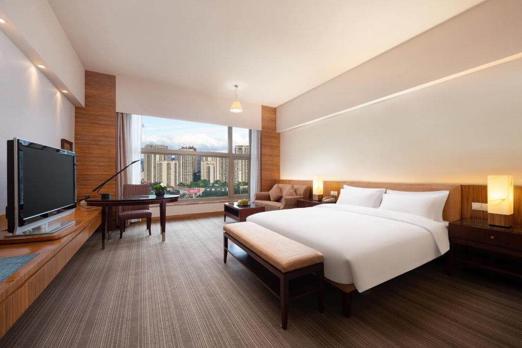 TV a/nebo společenská místnost v ubytování Parklane Hotel Changan