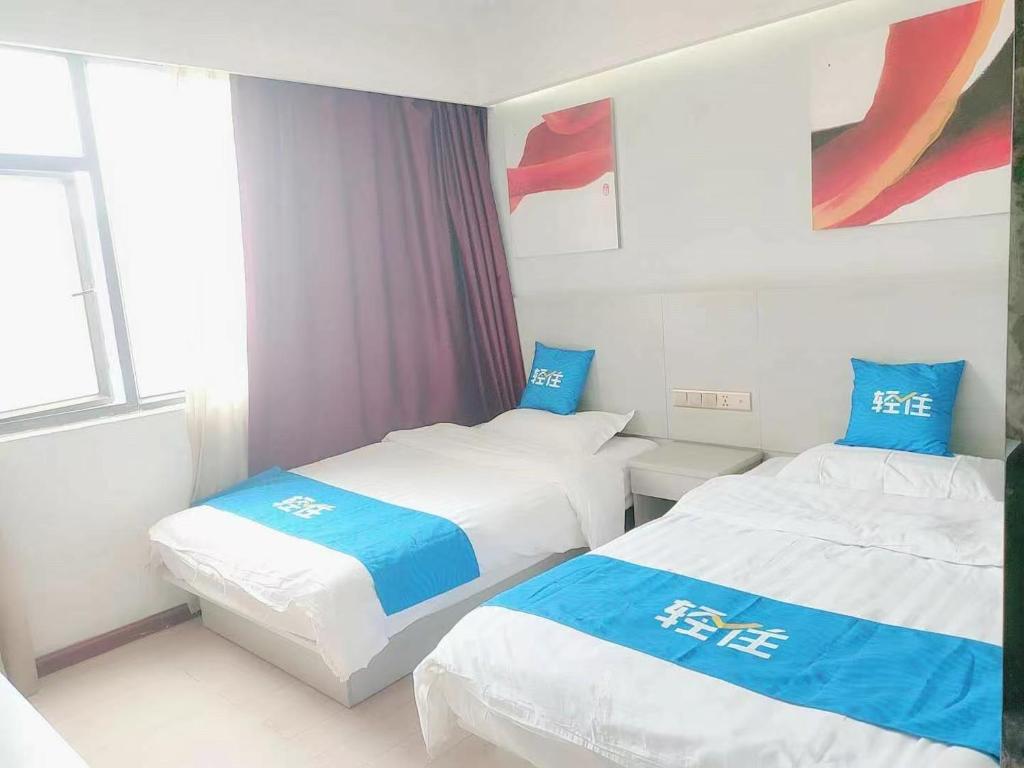 Postel nebo postele na pokoji v ubytování Juli Boutique Hotel