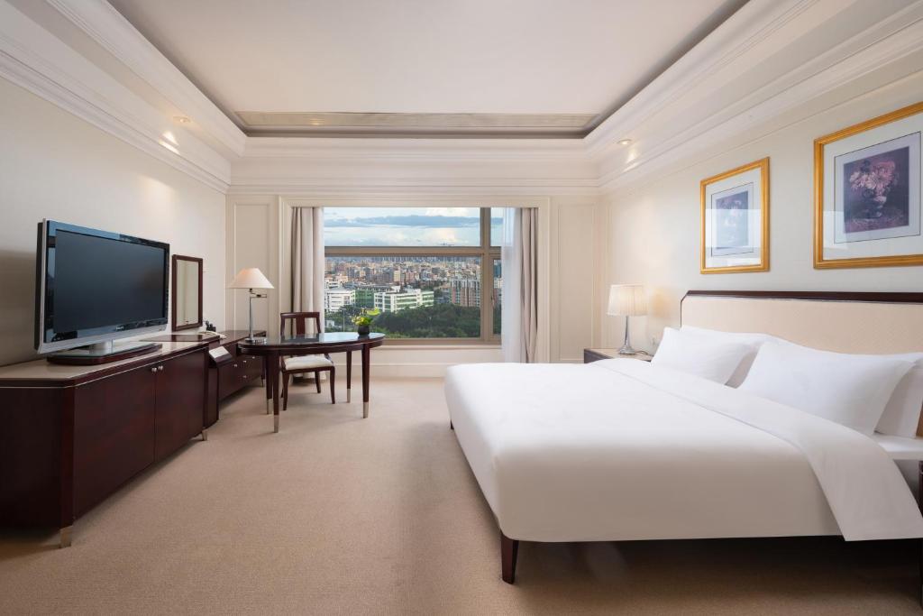 TV a/nebo společenská místnost v ubytování Parklane Hotel Changan