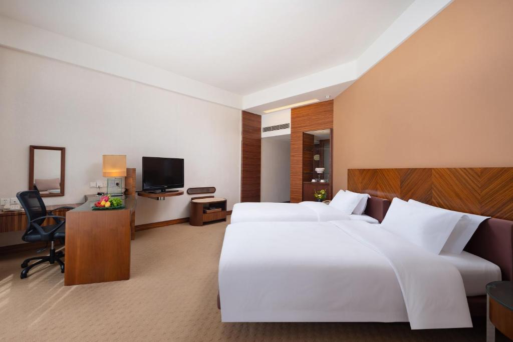TV a/nebo společenská místnost v ubytování Parklane Hotel Changan