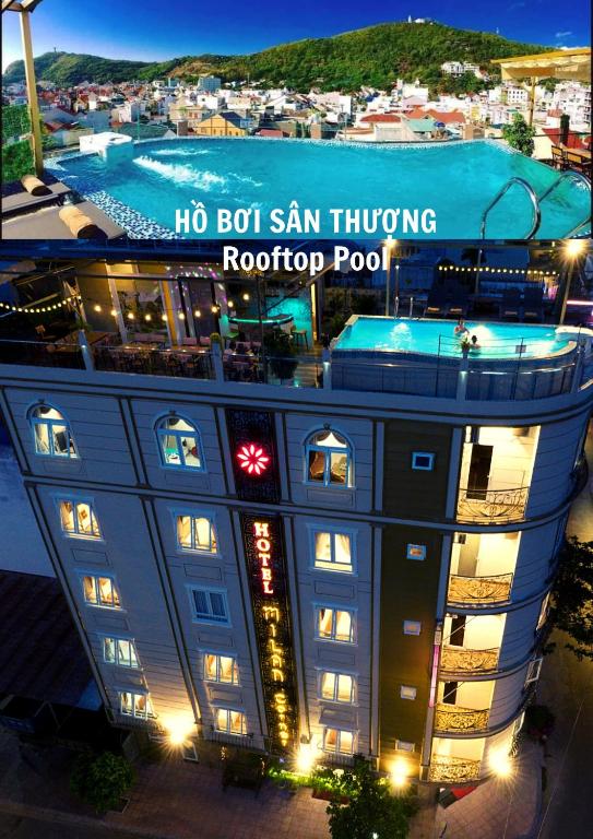 a building with a sign that reads hbo sanivating roof top pool at Milan Corner Hotel in Vung Tau
