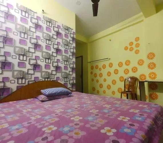 Postel nebo postele na pokoji v ubytování Amar priya guest house