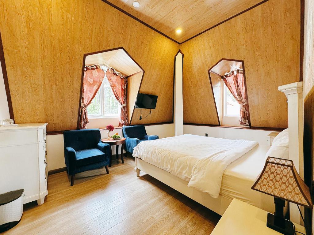 Postel nebo postele na pokoji v ubytování TTR Joy Apart' Hotel