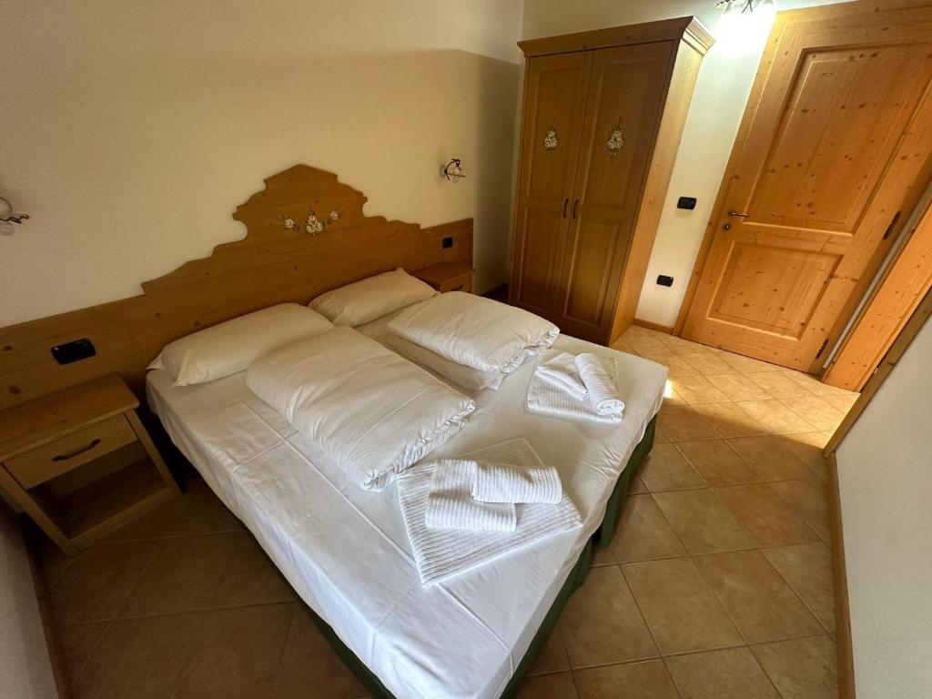 Postel nebo postele na pokoji v ubytování Locanda Castil