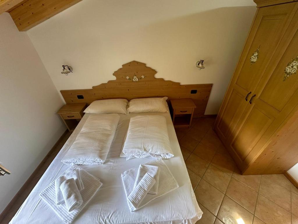 Postel nebo postele na pokoji v ubytování Locanda Castil