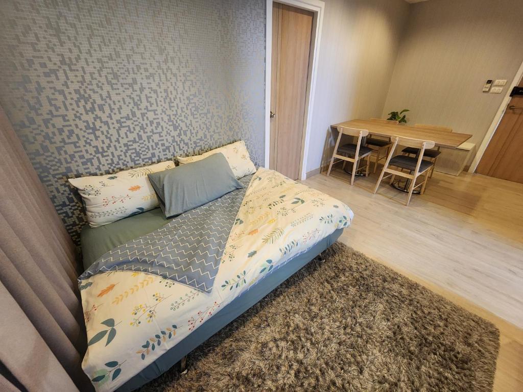 Postel nebo postele na pokoji v ubytování Family Suit 2 Bedrooms 2 Bathrooms in Chiang Mai