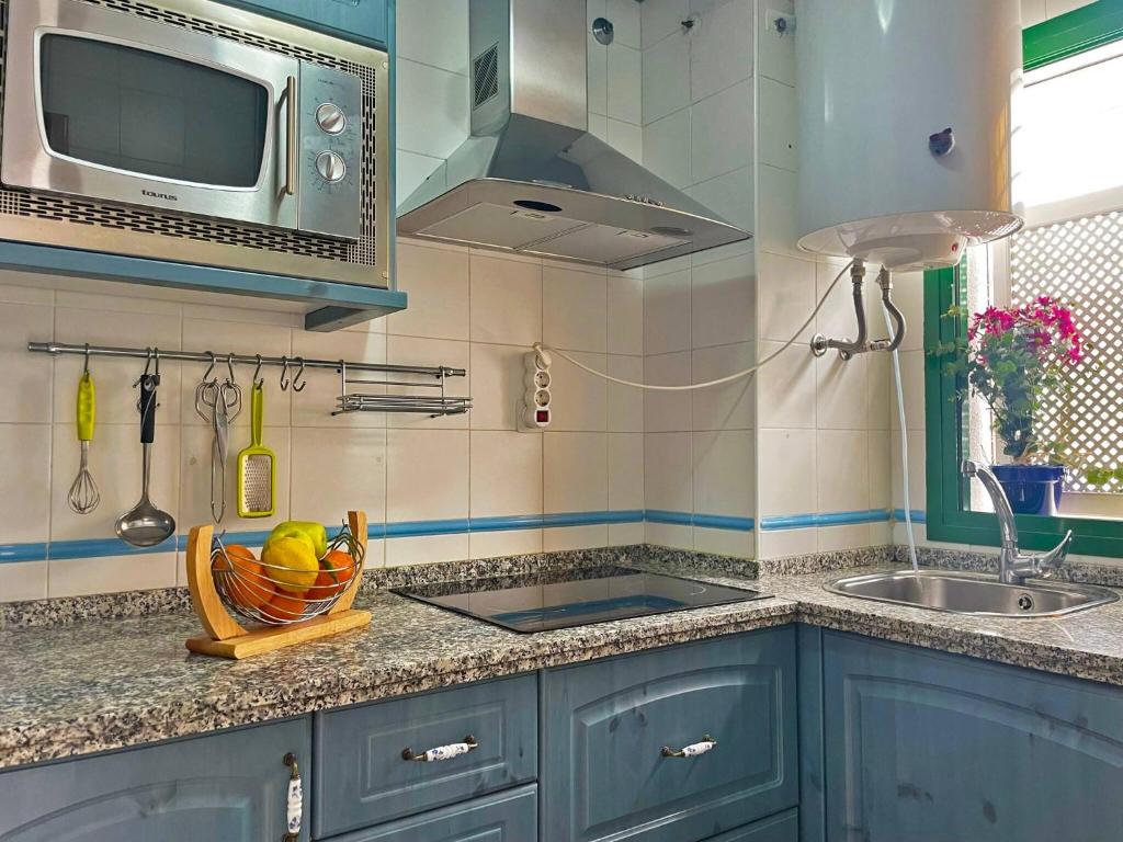 Kuchyňa alebo kuchynka v ubytovaní Apartamento Mayaguana - Ole Solutions