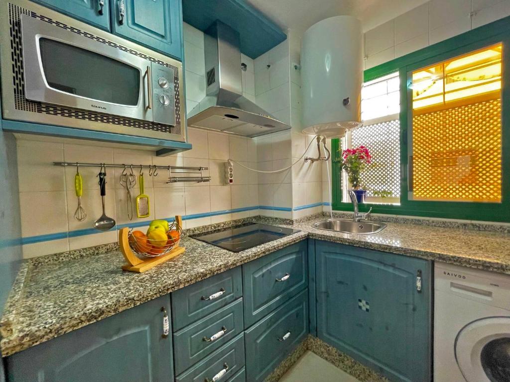 Kuchyňa alebo kuchynka v ubytovaní Apartamento Mayaguana - Ole Solutions
