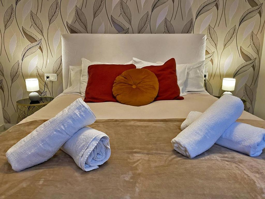 Łóżko lub łóżka w pokoju w obiekcie Apartamento Armas - Ole Solutions