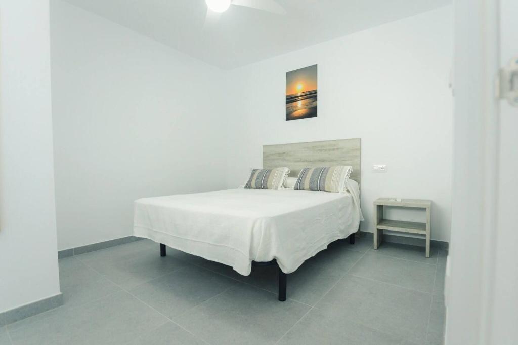 Posteľ alebo postele v izbe v ubytovaní Apartamento Carpe Diem - Ole Solutions