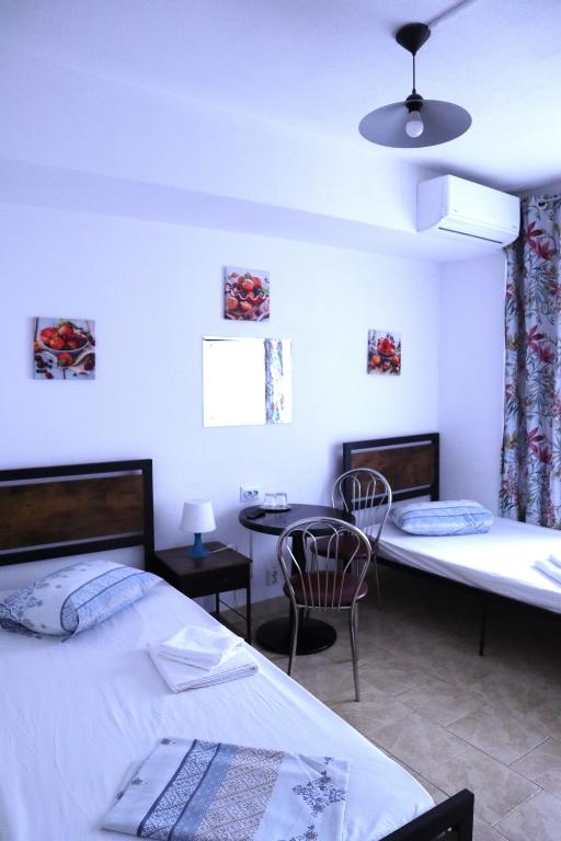 Postel nebo postele na pokoji v ubytování Taxi Hostel