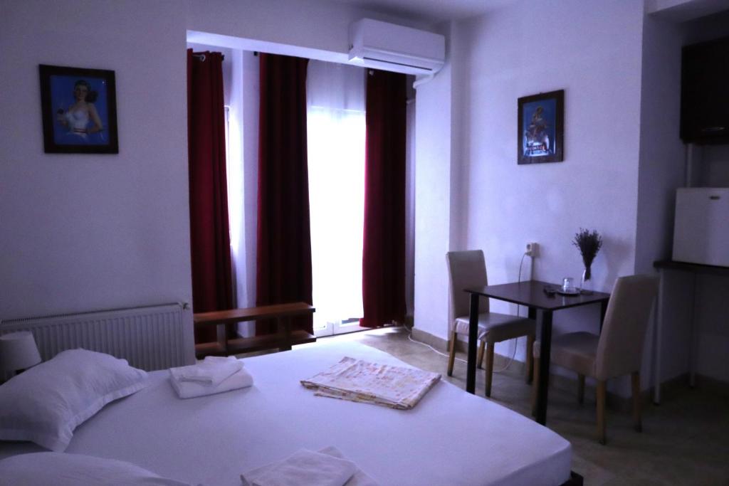 Postel nebo postele na pokoji v ubytování Taxi Hostel