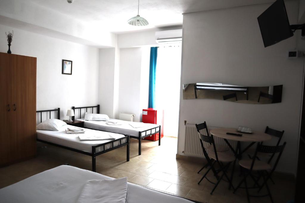 Postel nebo postele na pokoji v ubytování Taxi Hostel