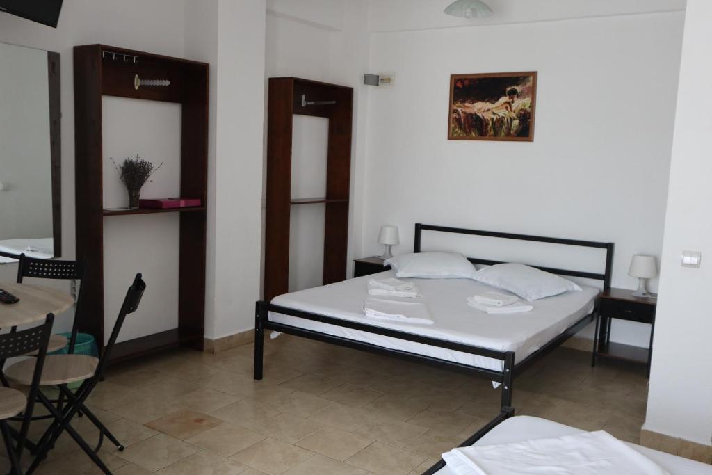 Postel nebo postele na pokoji v ubytování Taxi Hostel