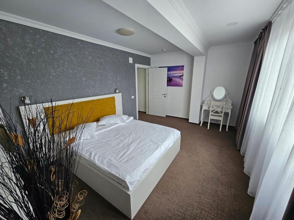Postel nebo postele na pokoji v ubytování Ilinca