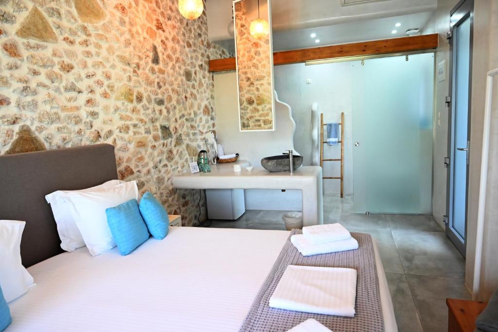 Postel nebo postele na pokoji v ubytování Agorastos Luxury Living