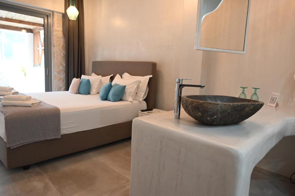 Postel nebo postele na pokoji v ubytování Agorastos Luxury Living