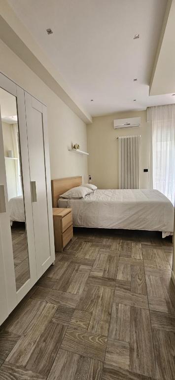 Postel nebo postele na pokoji v ubytování B&B Via Roma