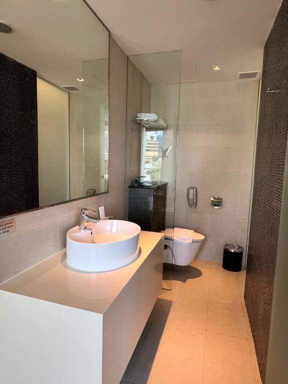 Koupelna v ubytování D'Hotel Singapore managed by The Ascott Limited