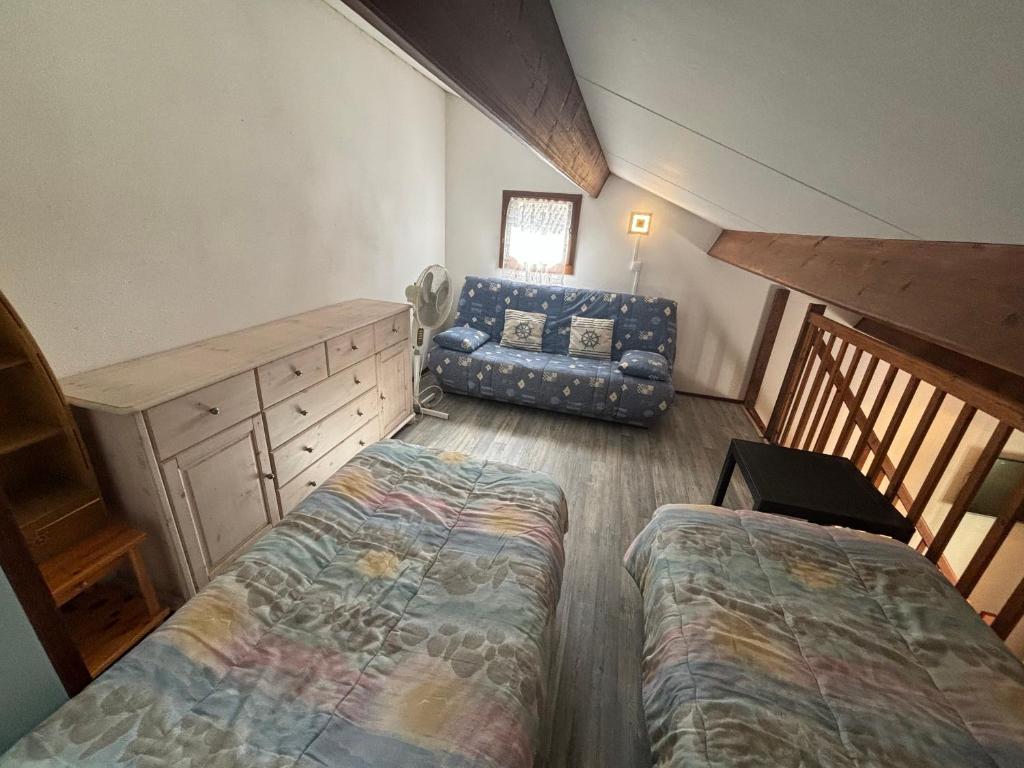 Posteľ alebo postele v izbe v ubytovaní Maisonnette hameau des pins