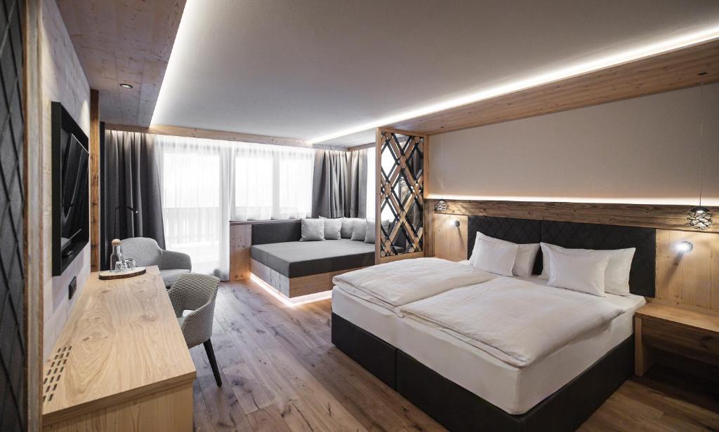Postel nebo postele na pokoji v ubytování Hotel Alpenblick
