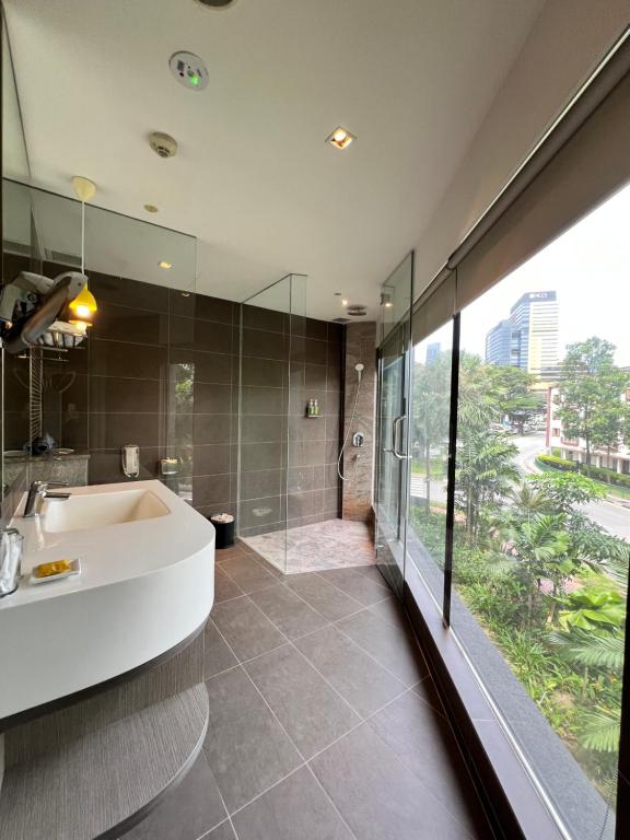 Koupelna v ubytování D'Hotel Singapore managed by The Ascott Limited