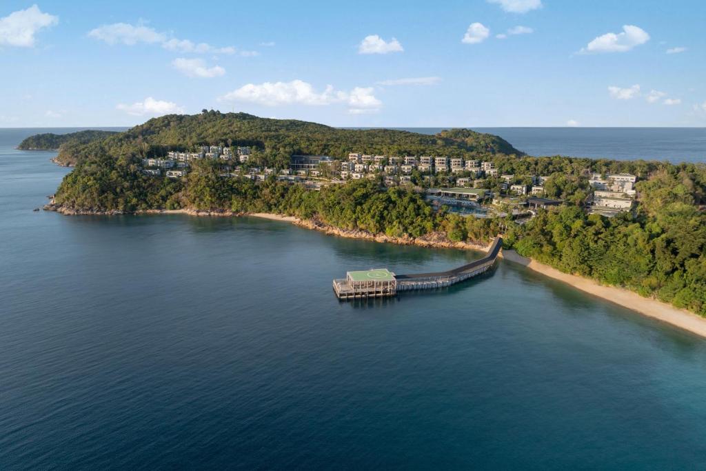 an island in the middle of a body of water at Perhentian Marriott Resort & Spa in Perhentian Islands